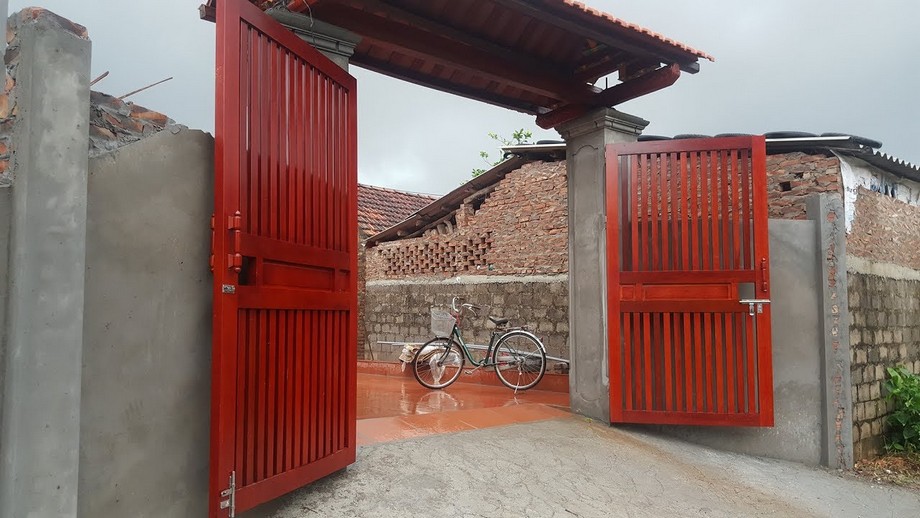 Cổng gỗ làm tăng tính thẩm mỹ cho ngôi nhà