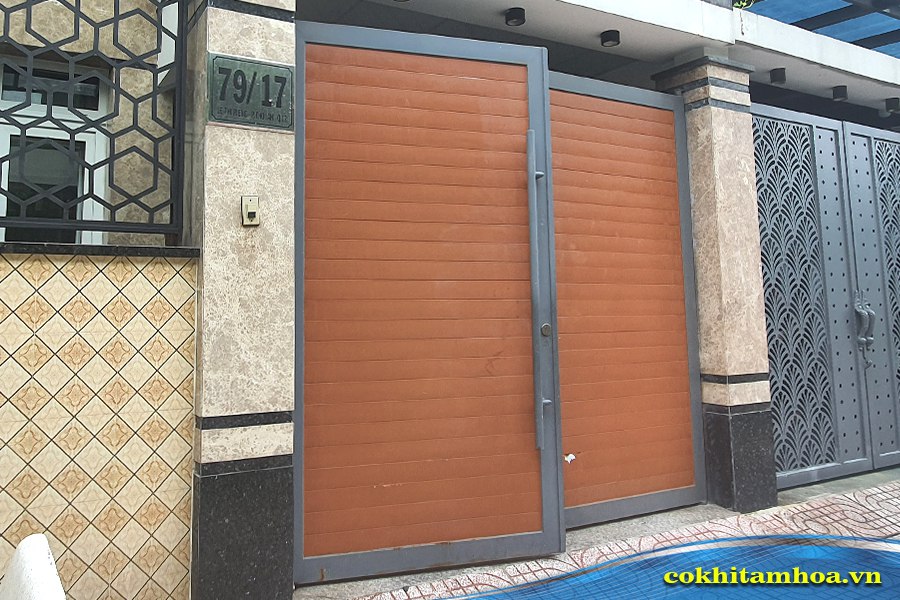 Mẫu cửa cổng giả gỗ